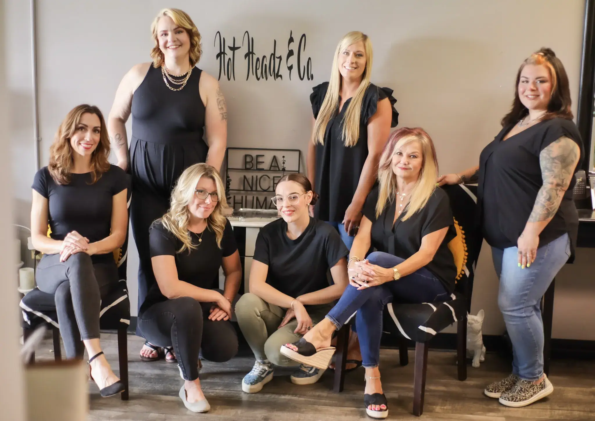 group photo of hot headz salon staff